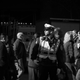 A police officer watches pedestrians in midtown Manhattan.